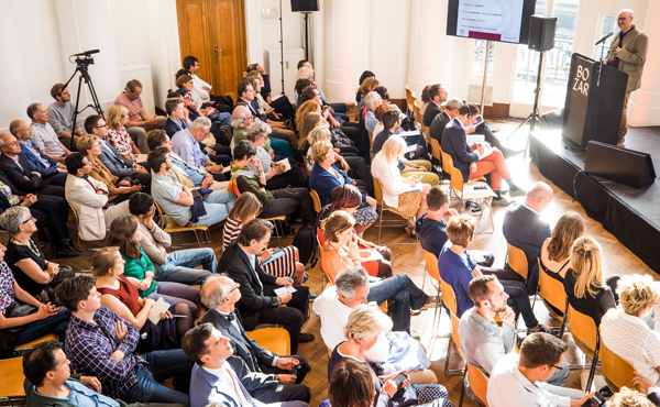 P&V Foundation president Olivier Servais addresses a packed room at BOZAR during the P&V Foundation’s "Revolution@work" debate on the future of work.	